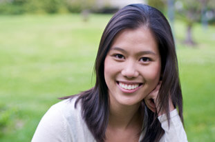young woman smiling with perfect teeth